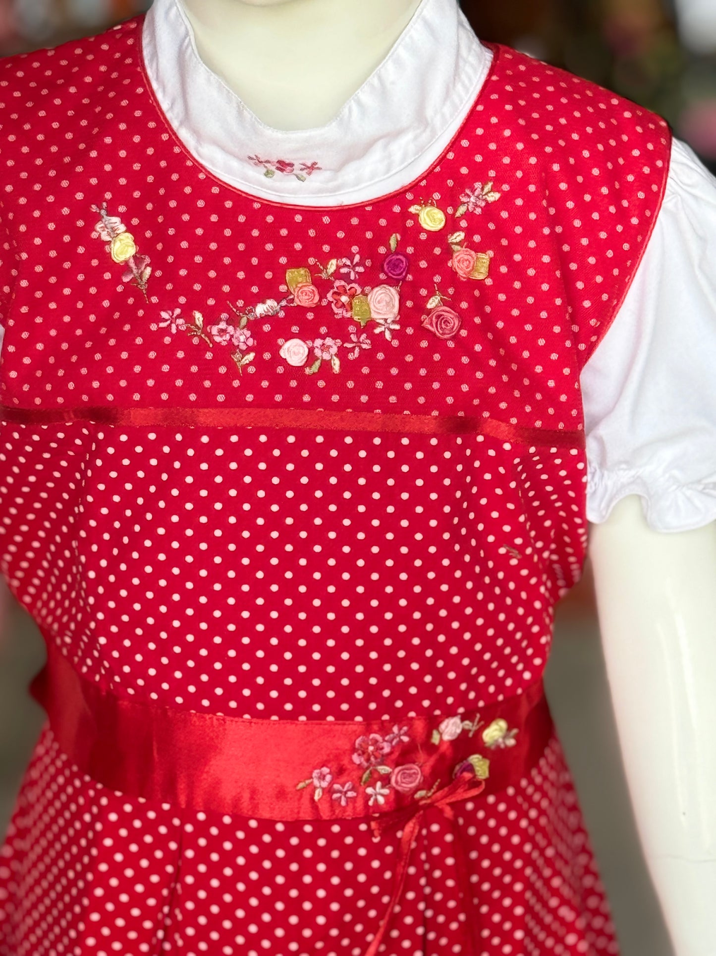 Red polka dots sleeveless cotton embroidered frock with embroidered white puff sleeves inner top for little girls
