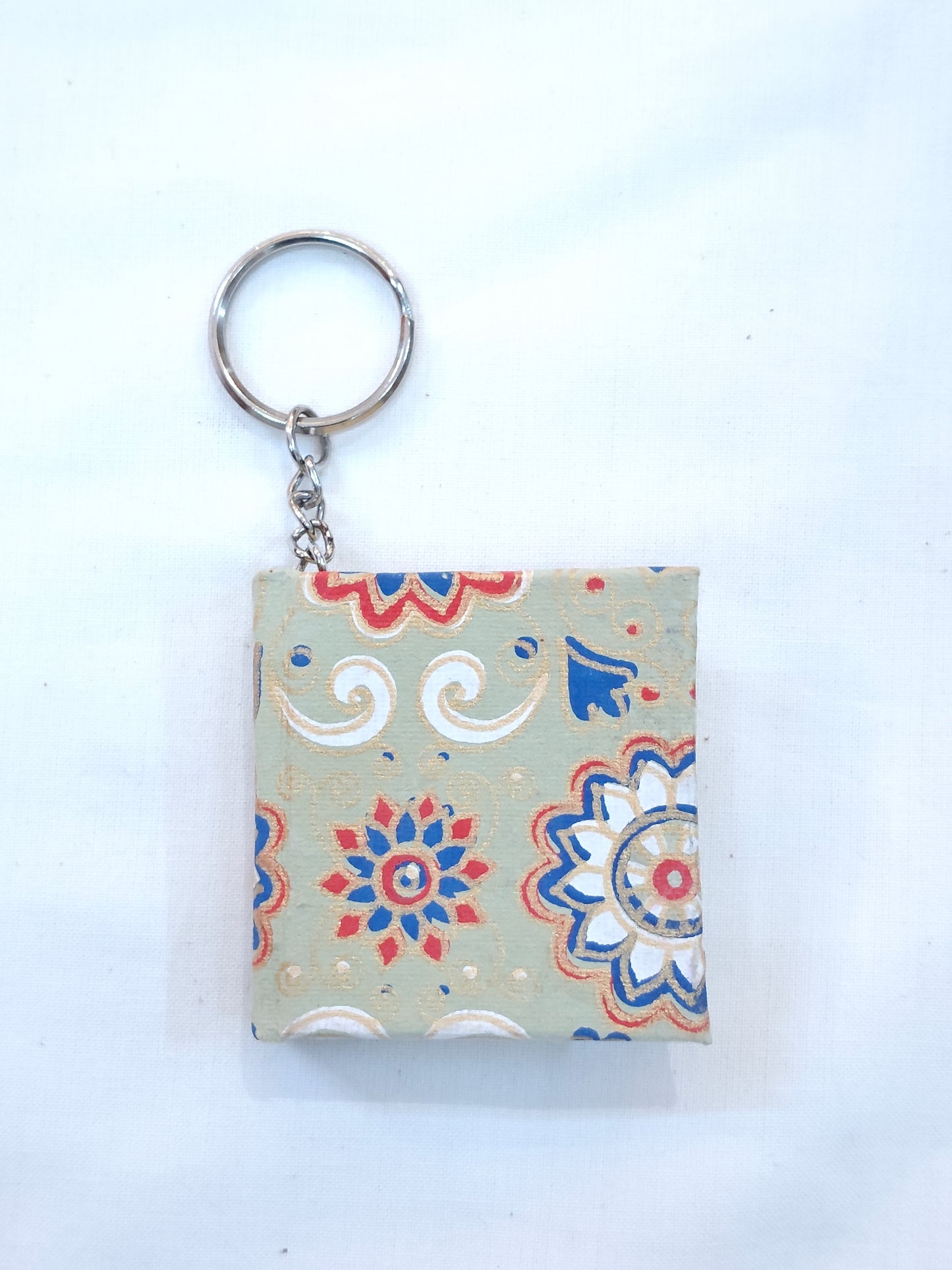 Key ring with small hand made paper notebook