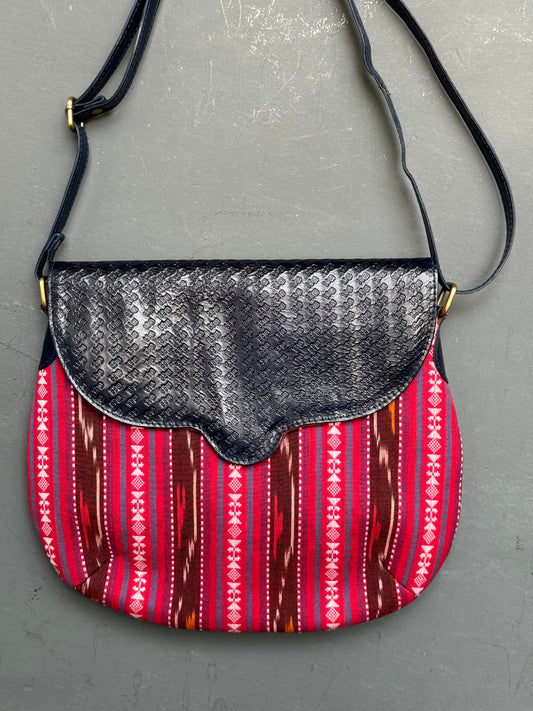 Pink fabric and black embossed leather hand crafted adjustable length sling bag