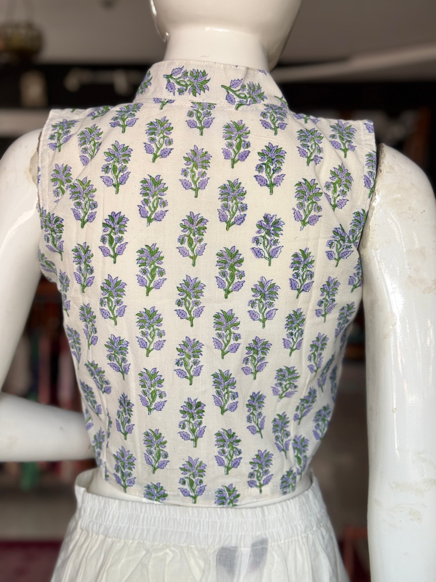 Floral hand block printed handwoven cotton sleeveless blouse with back round collar