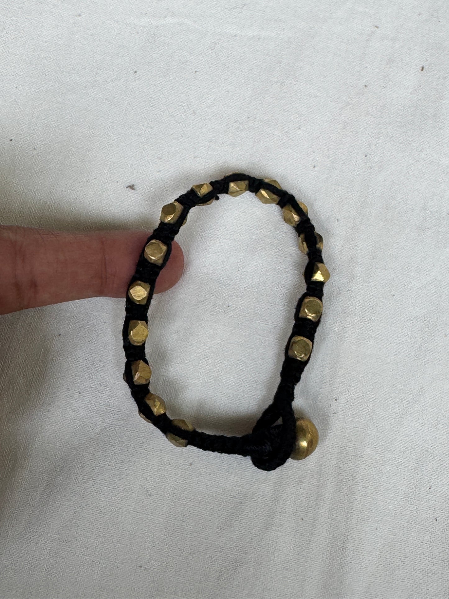 Nazariya bracelet - brass dokra handcrafted beads with black thread - single