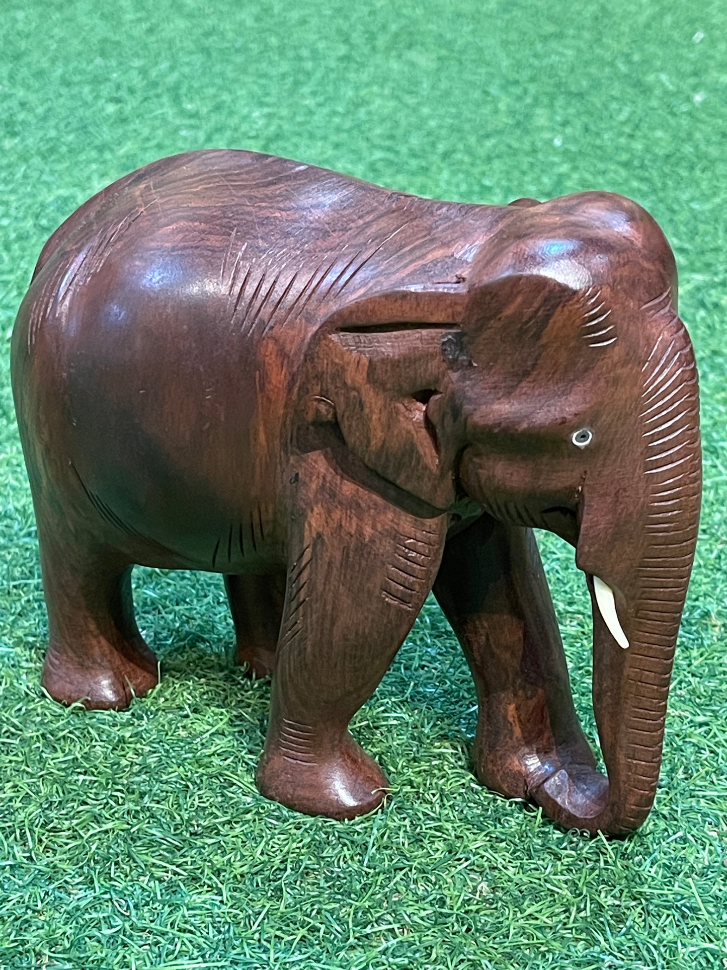 Solid rose wood hand carved wooden elephant decor with beautiful wooden grains patterns