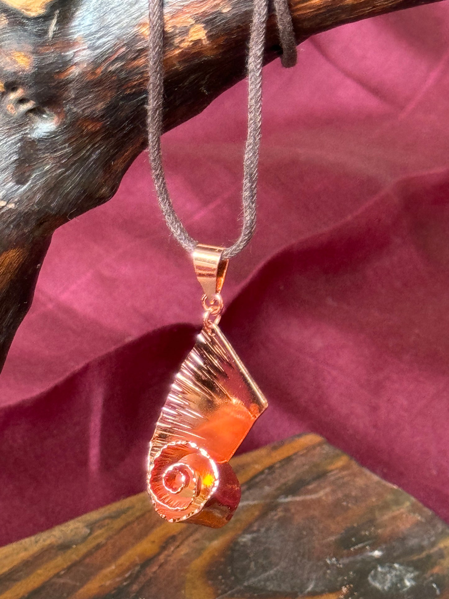 Vakratunda, twisted elephant trunk handcrafted copper pendant with brown thread