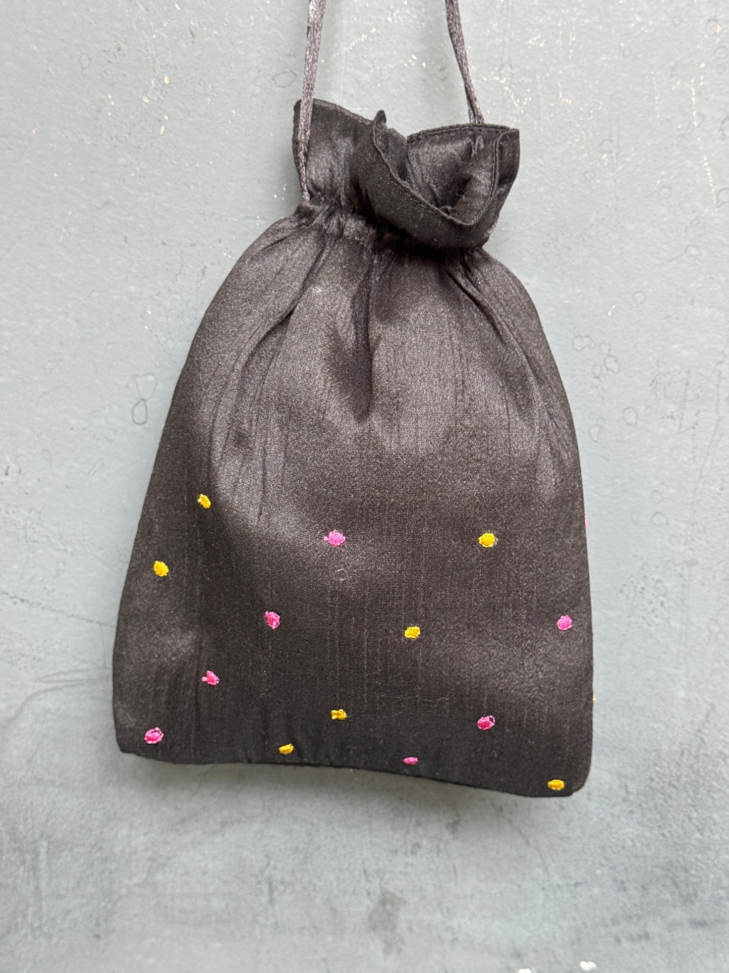 Art silk 9x7 inches potli with machine embroidery