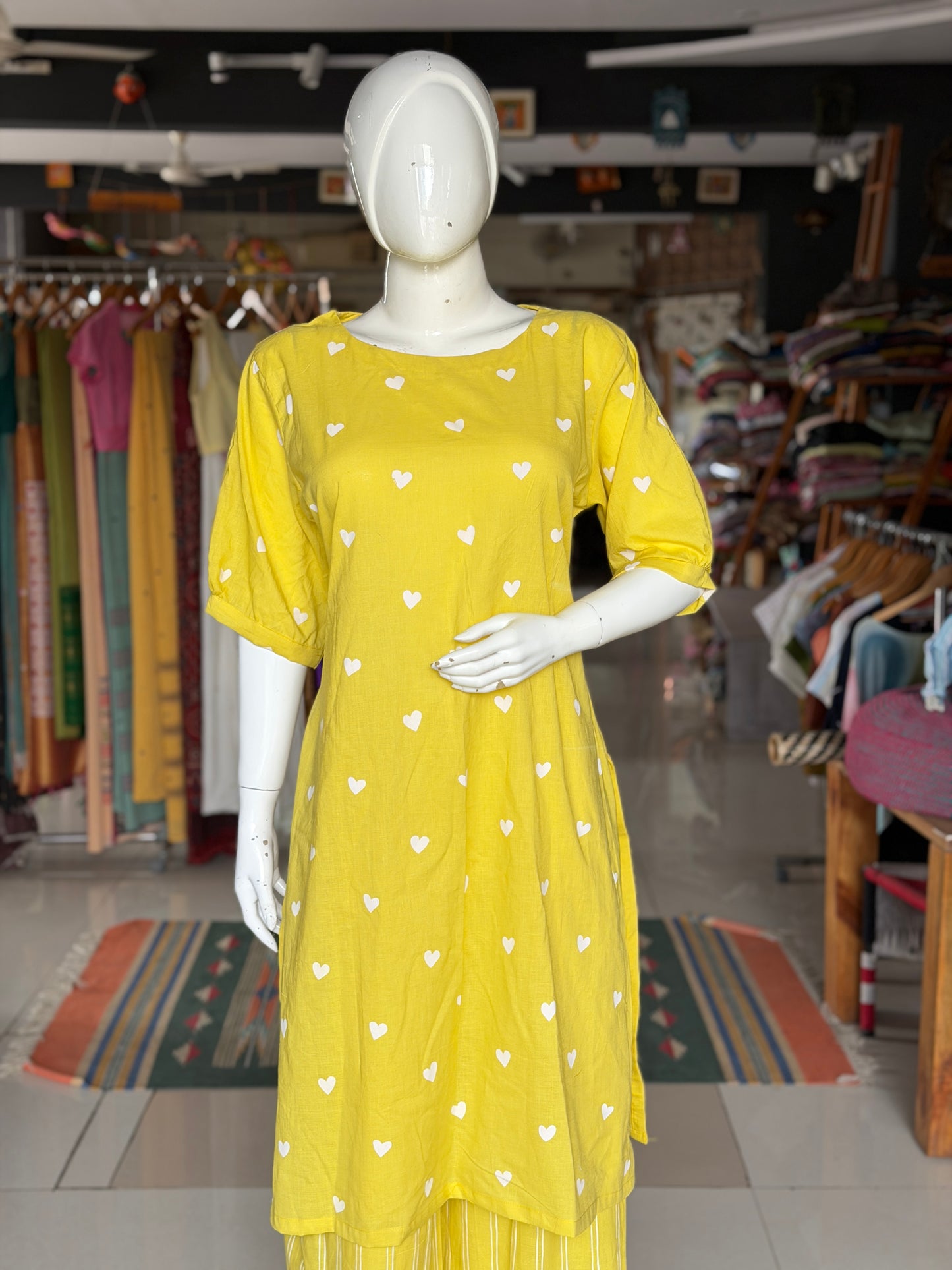 Yellow hearts print cotton kurti paired with a matching stripes print barrel pants - 2 piece set