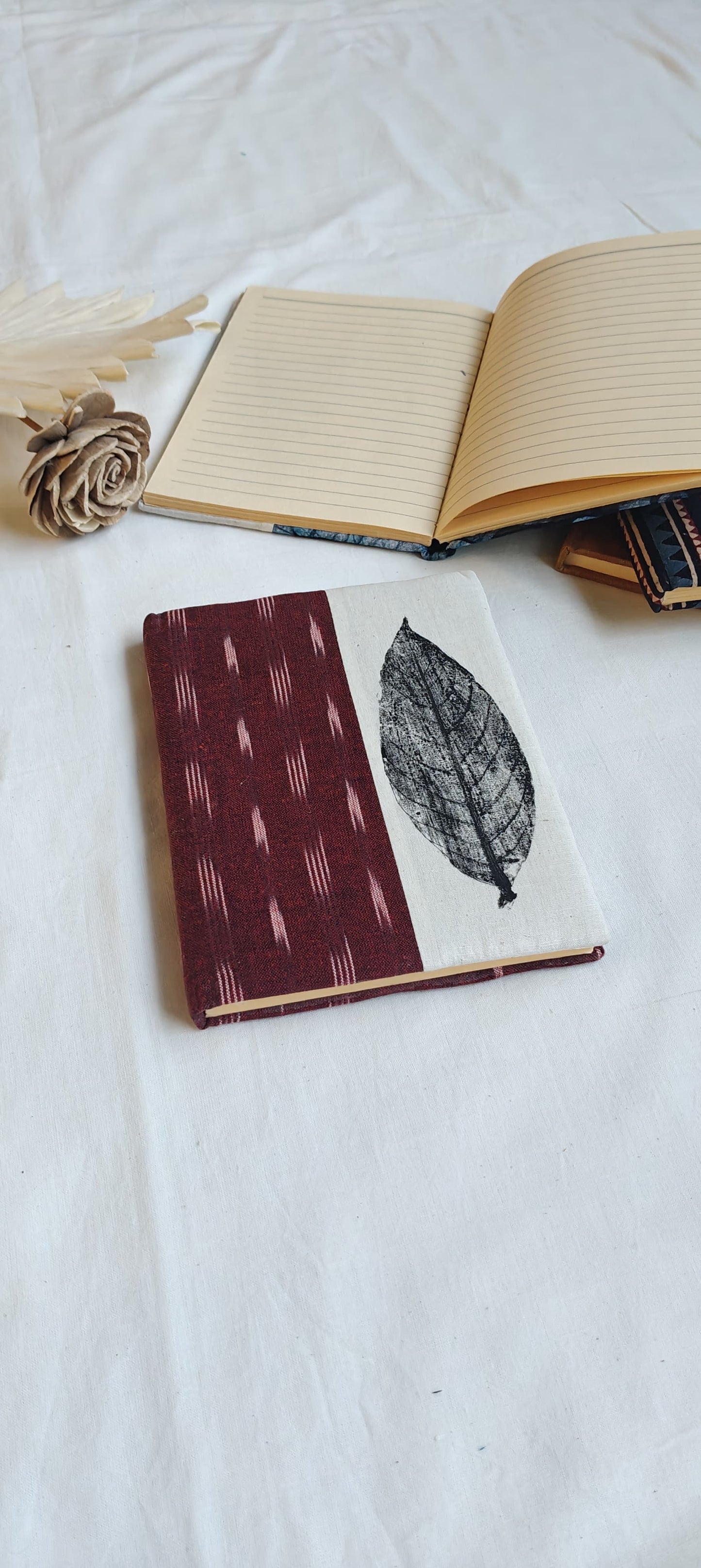 Handmade paper notebooks with hand eco printed fabric cover