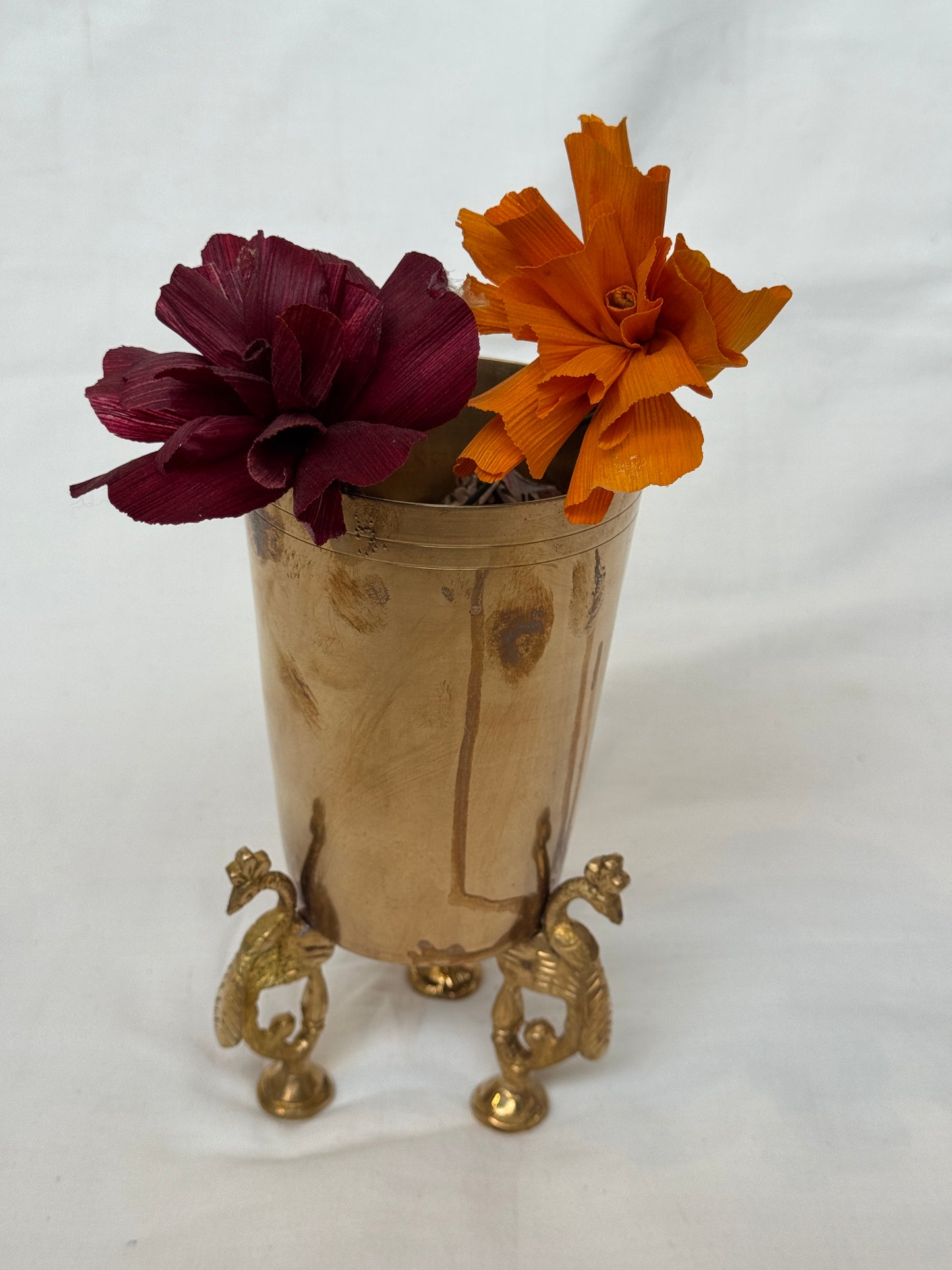 Brass tumbler vase with peacock legs