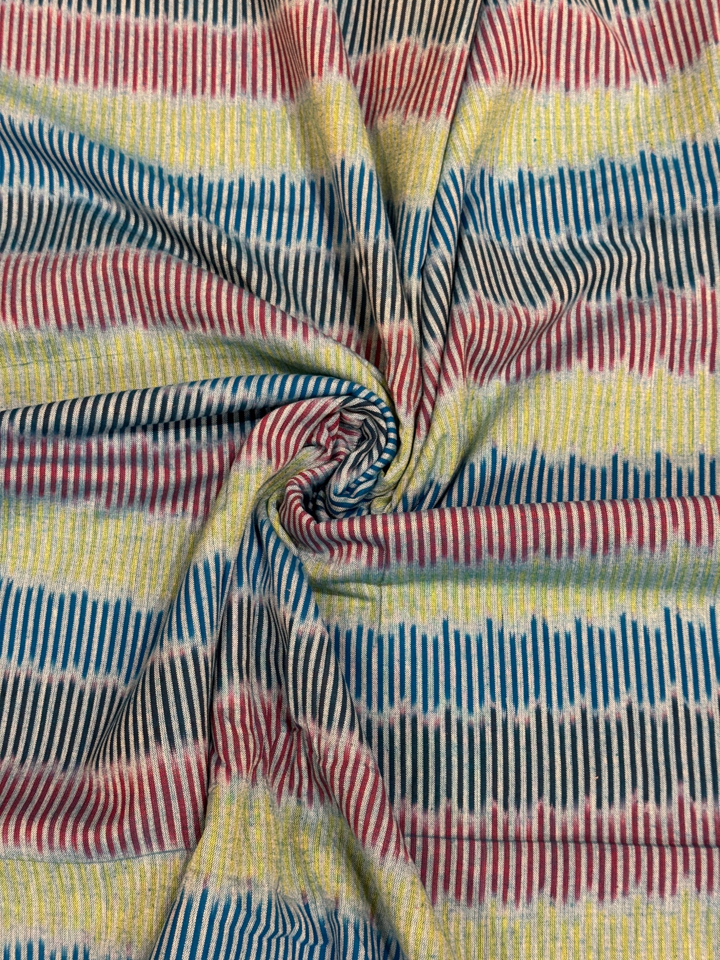 Longitudinal wave - green , blue, black, red stripes cotton handloom ikat fabric