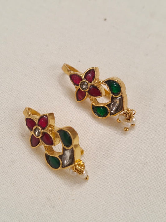 Four petal flower shaped silver ear clip ons in Pink and green stones