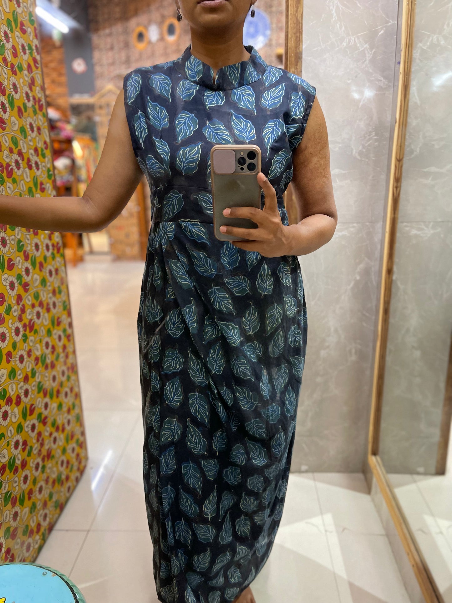 Black hand block printed dress with leaves print and pleats at waist