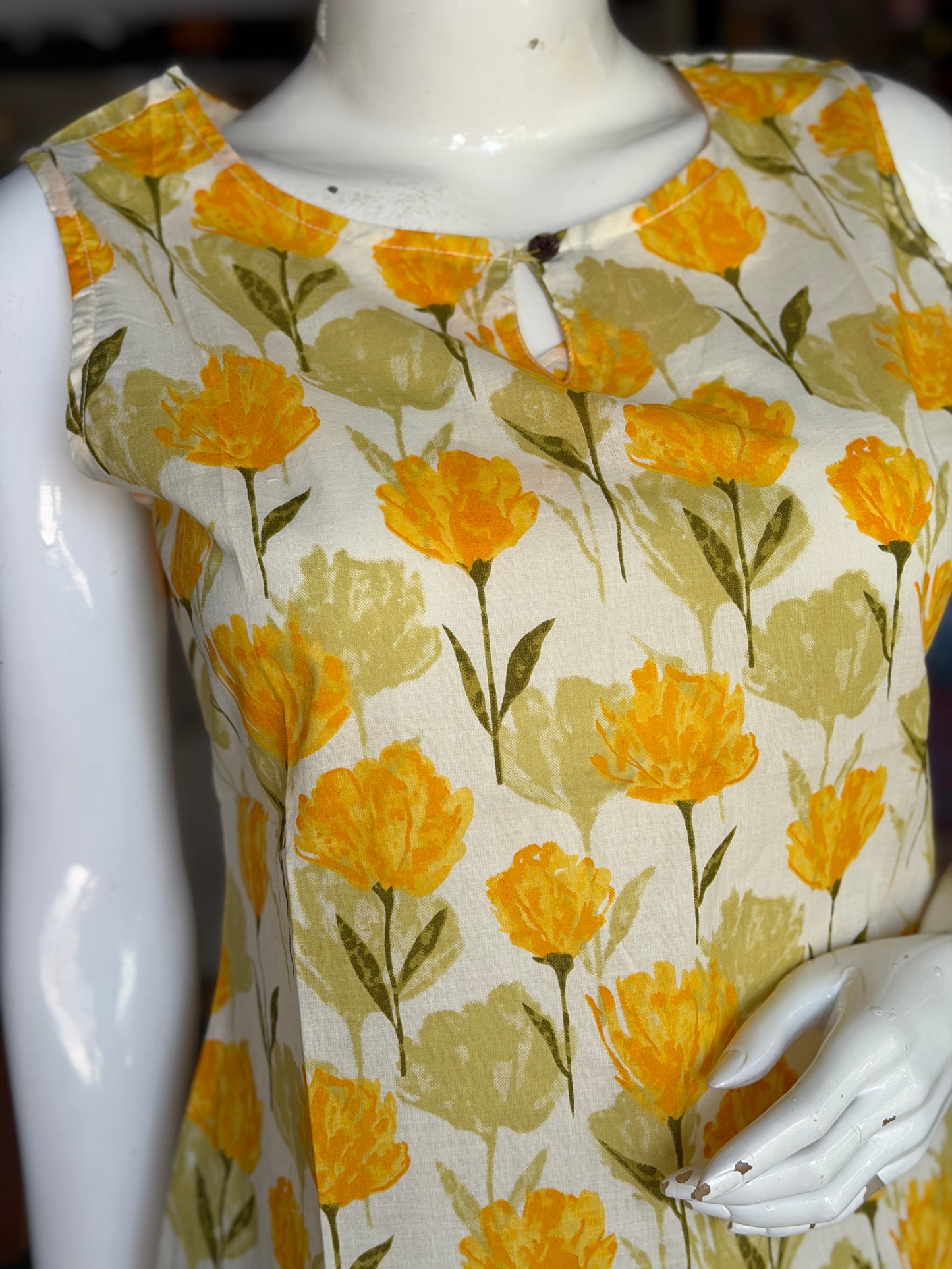 Cream and yellow cotton floral print sleeveless short top