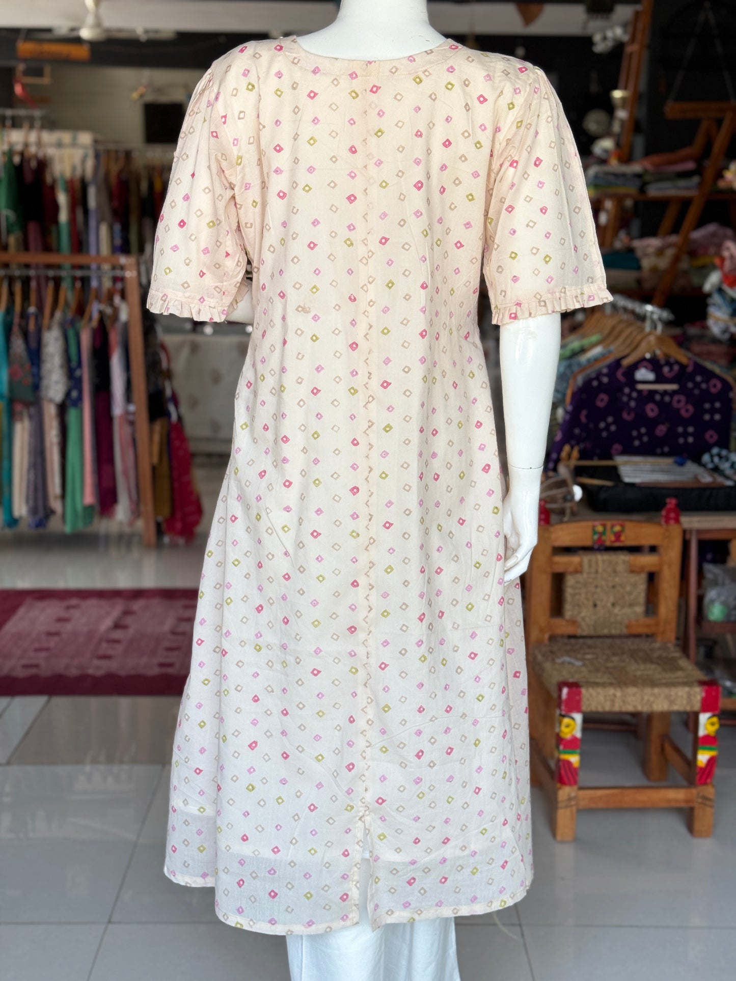 Diamond print light peach hand block perched cotton A-line kurti / dress with frill neck line