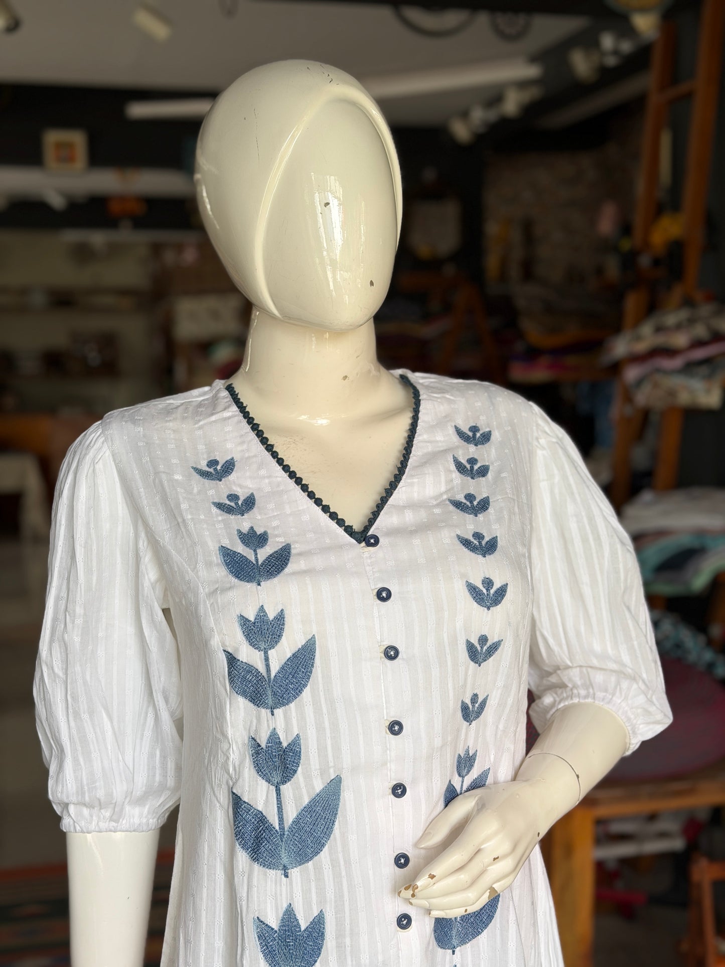 White and blue embroidered cotton dress with self stripes