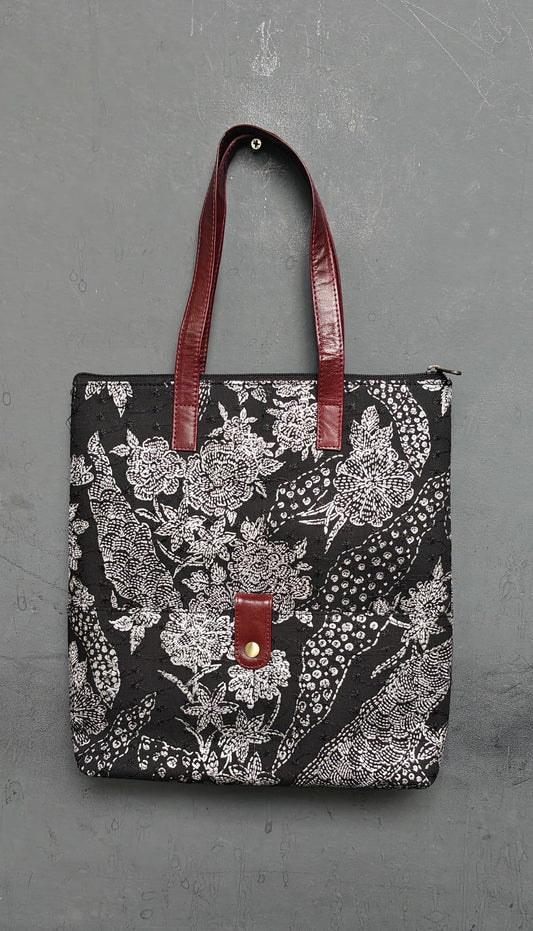 Hand crafted fabric tote bag with leatherflap closure front pocket and leather handles