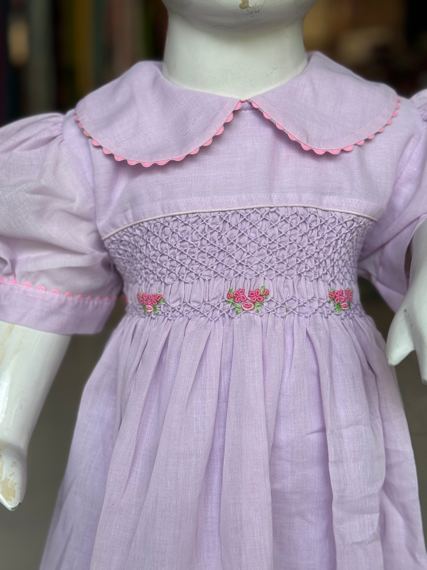 Lavender hand embroidered smocking cotton frock for girls with collar and lace trims
