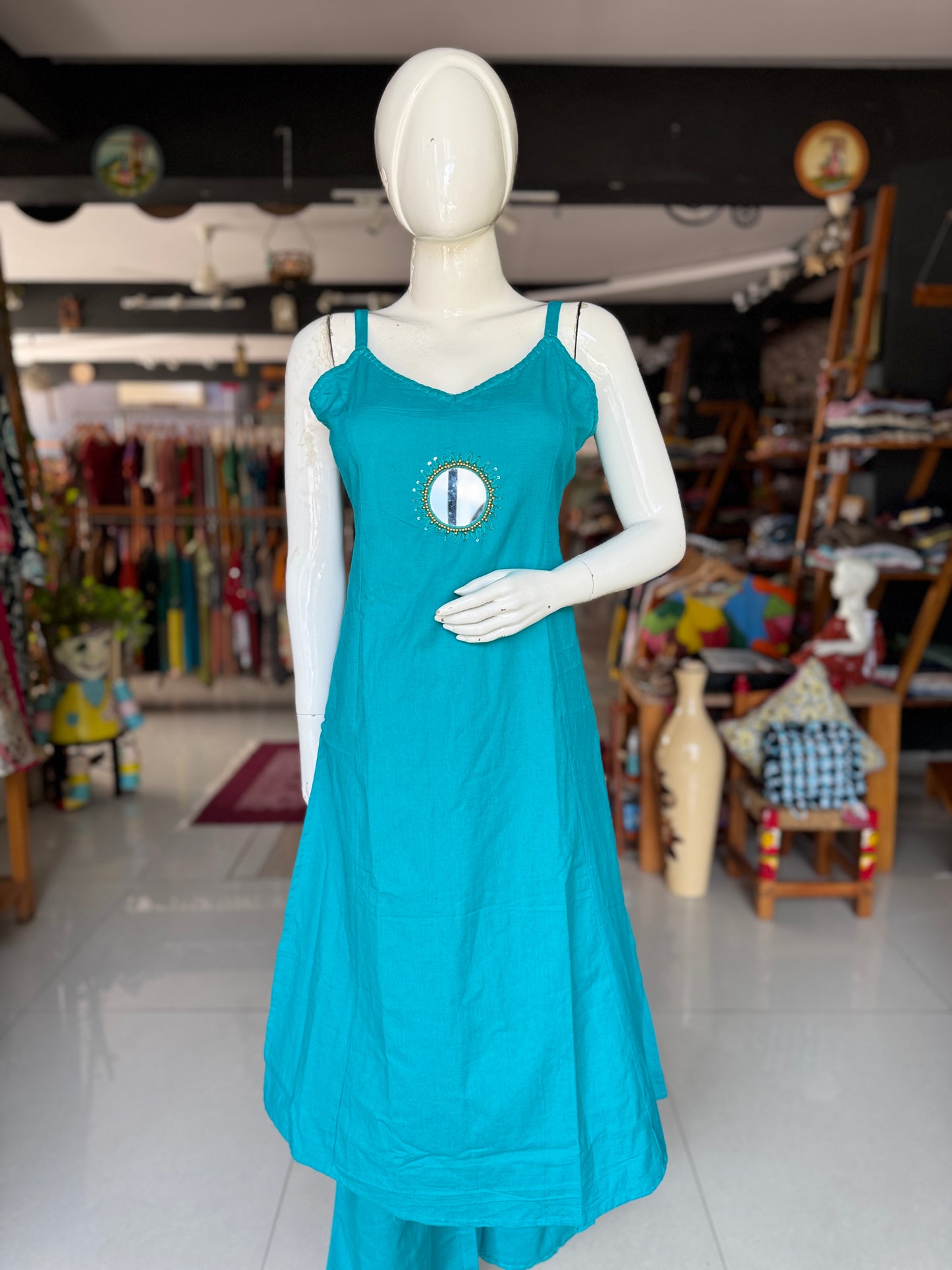Plain flex cotton sleeveless Kurti with mirror embroidery, blanket stitch embroidery and flared palazo pants - 2 piece set