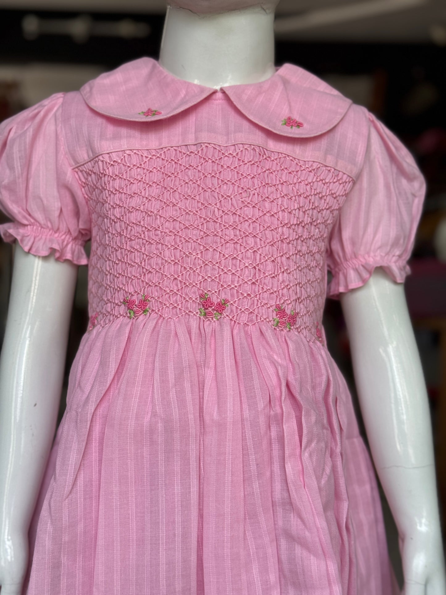 Light pink stripes hand embroidered smocking cotton frock for girls with collar