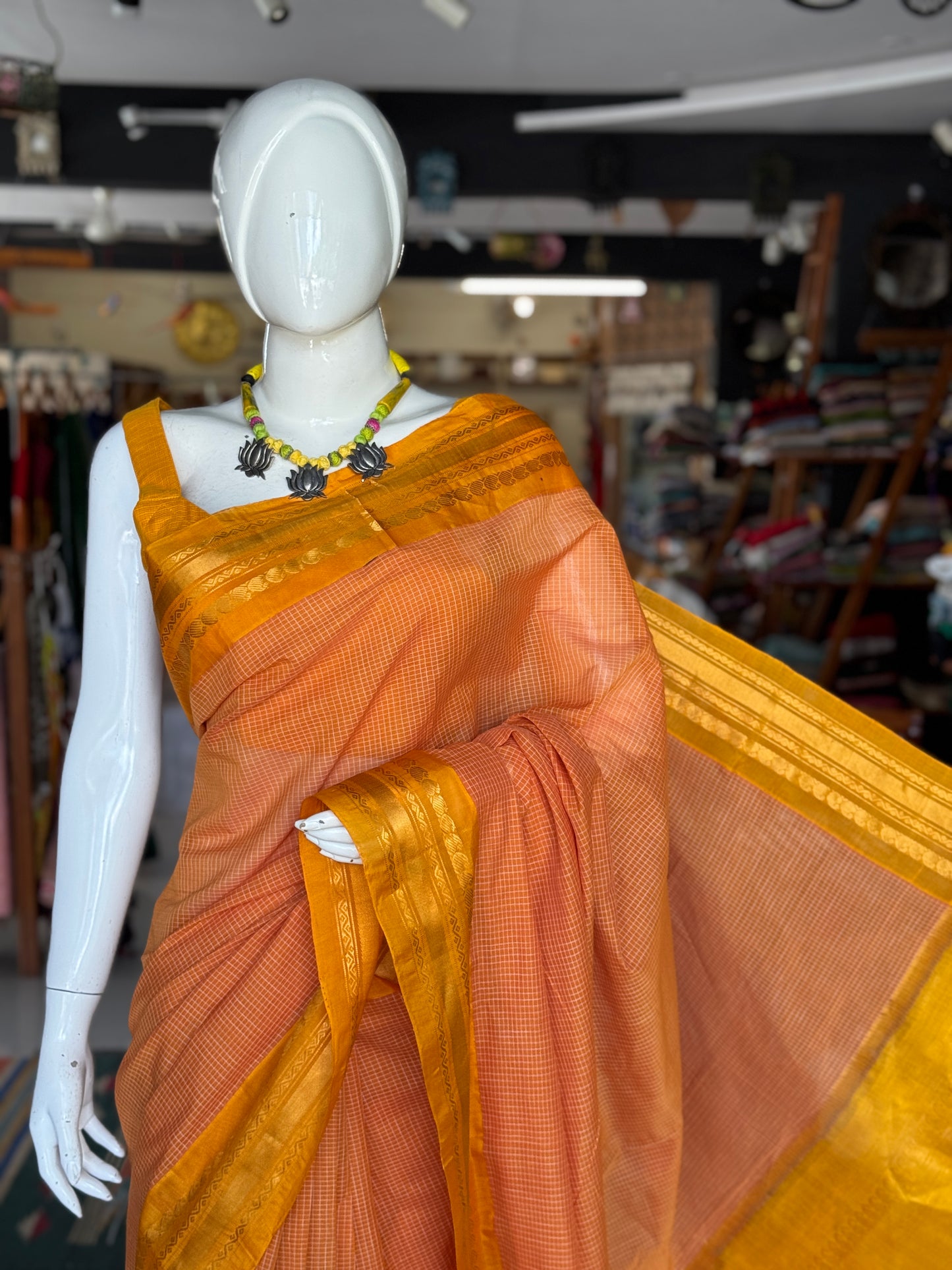 Kanakambar peach checks body with yellow border - handwoven Gadwal cotton saree with silk Pallu and borders
