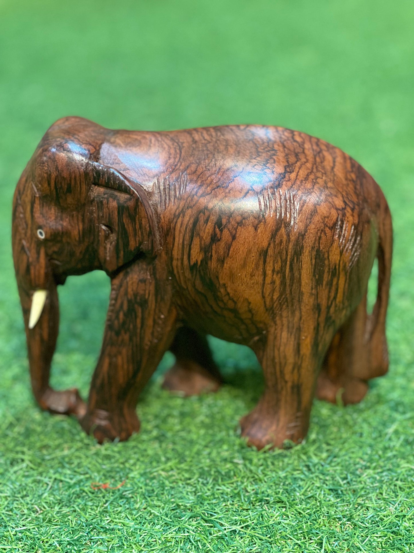 Solid rose wood hand carved wooden elephant decor with beautiful wooden grains patterns