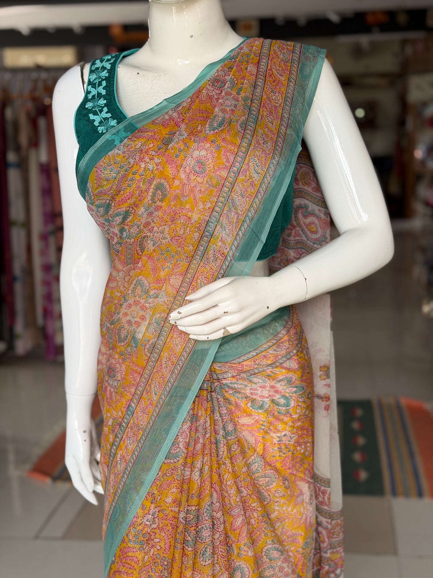 Mustard yellow Chiffon floral printed saree with teal border