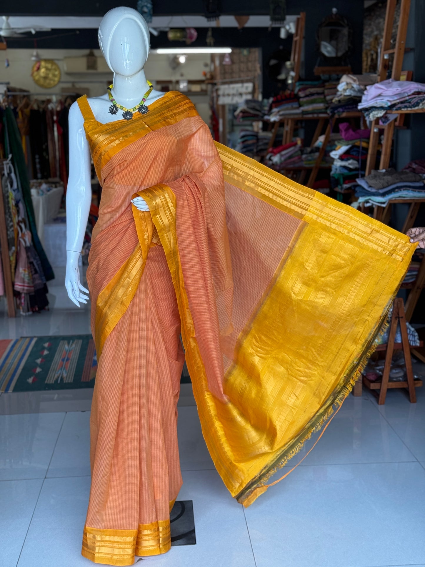 Kanakambar peach checks body with yellow border - handwoven Gadwal cotton saree with silk Pallu and borders