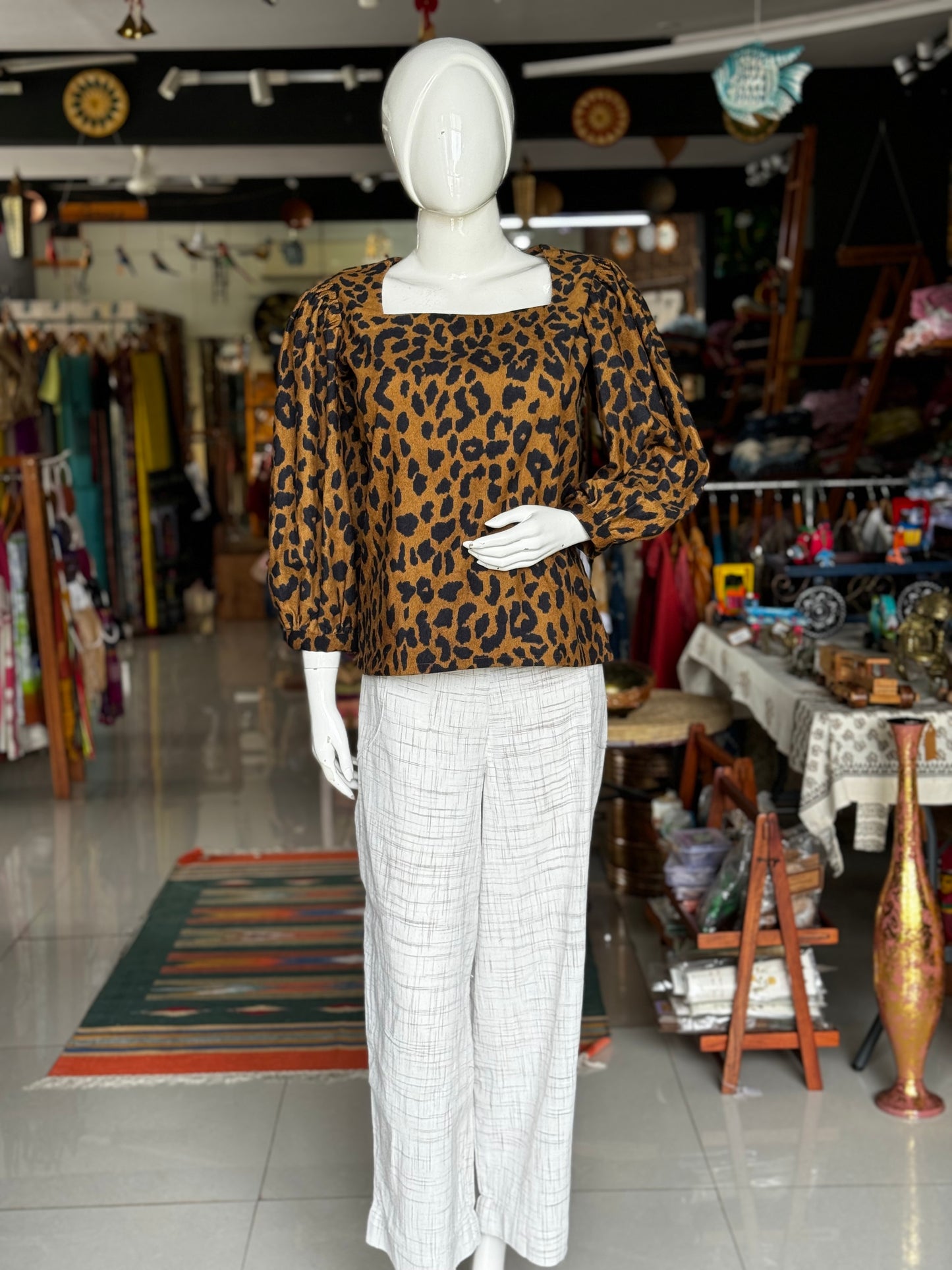 Brown and black corduroy top with leopard animal print