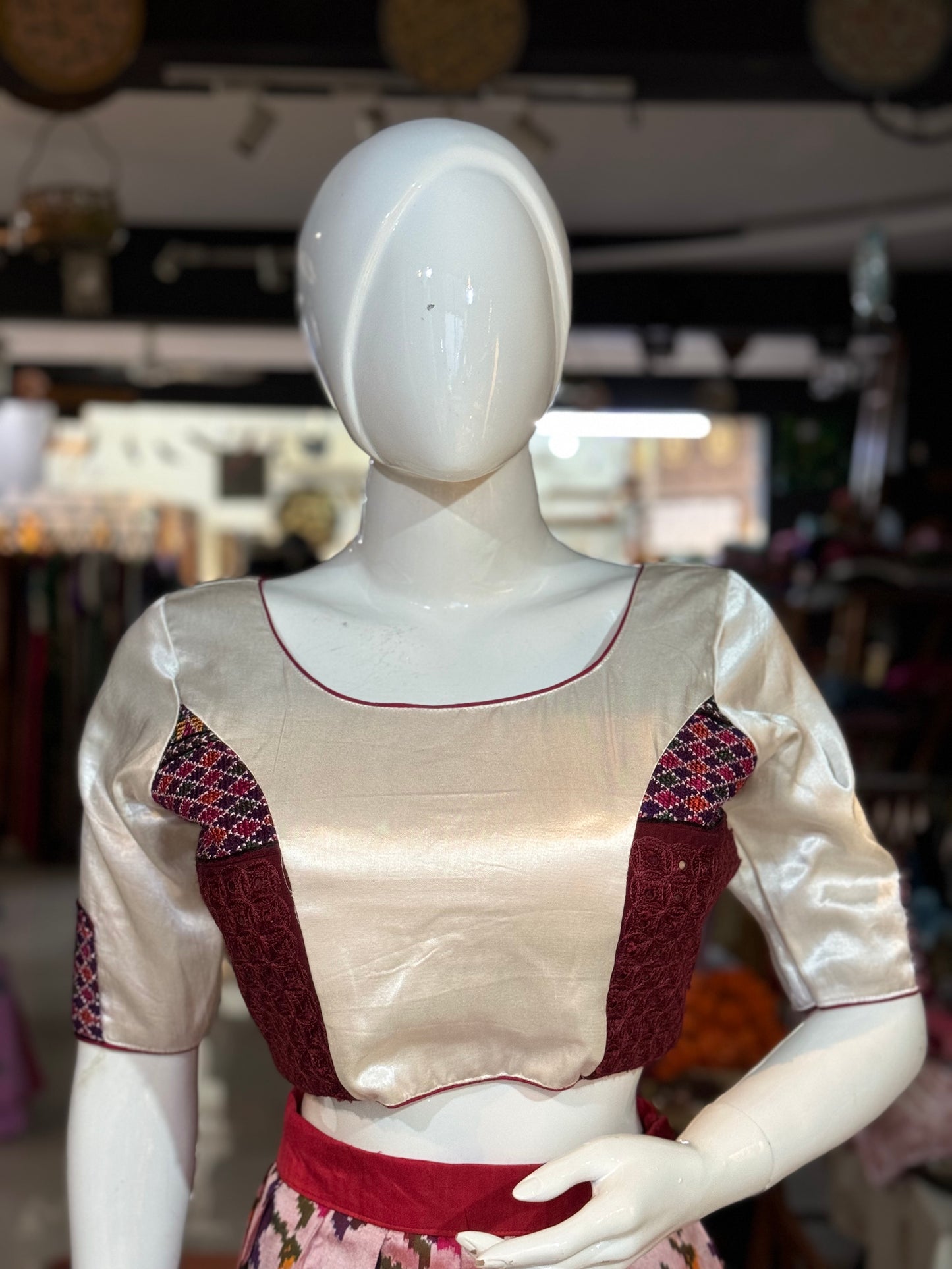 Off white mashru blouse with colorful embroidered on front and sleeves