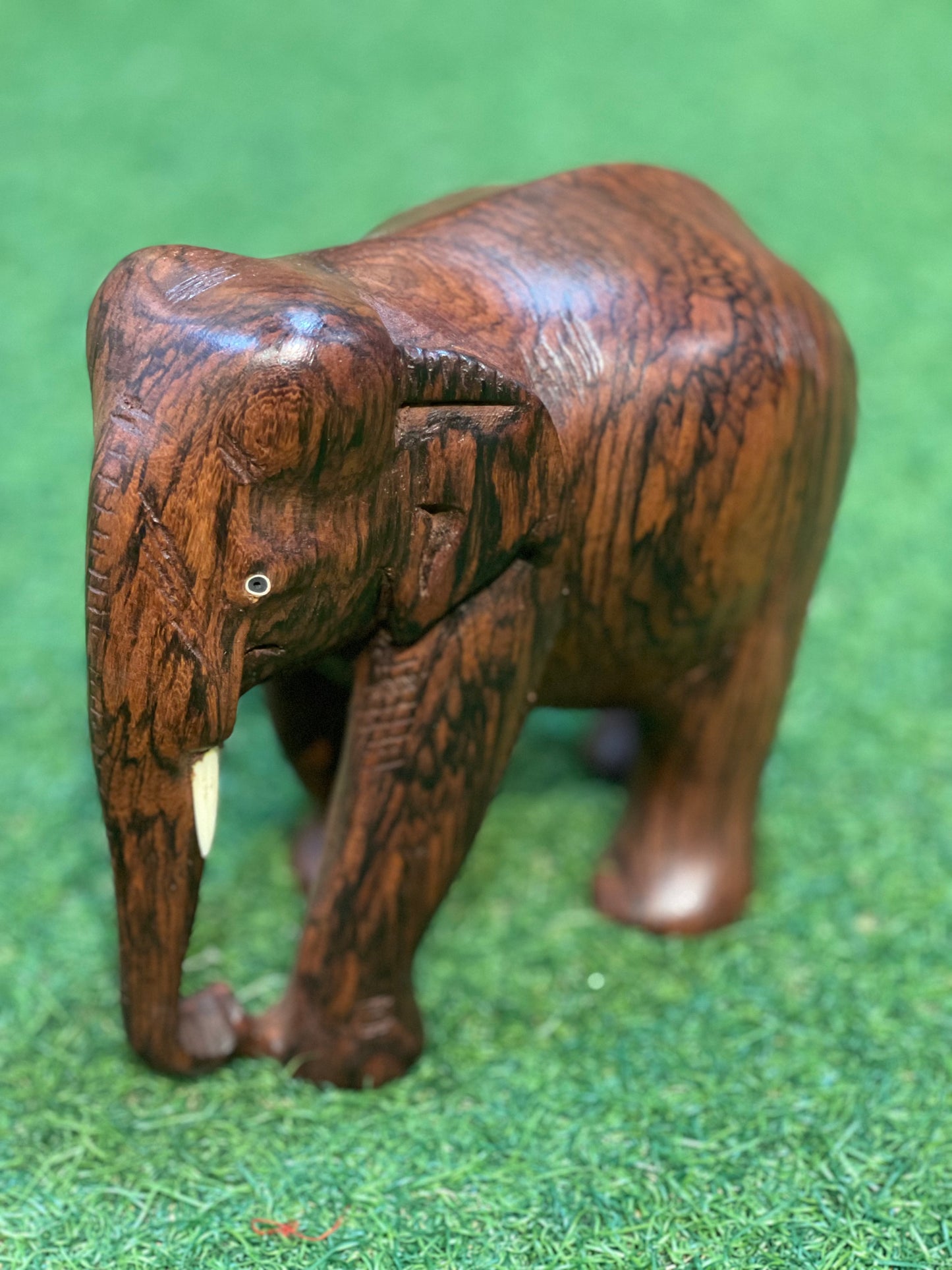 Solid rose wood hand carved wooden elephant decor with beautiful wooden grains patterns