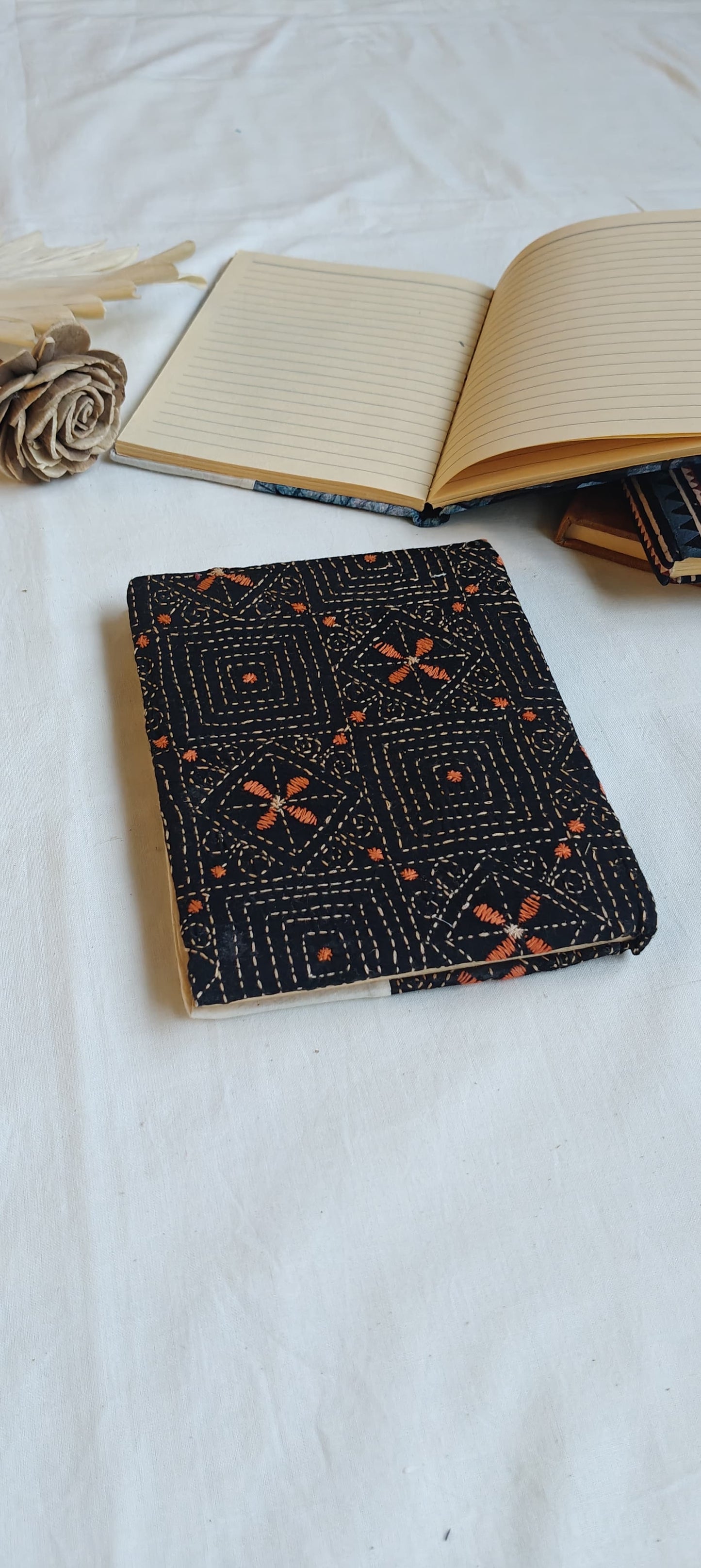 Handmade paper notebooks with hand eco printed fabric cover