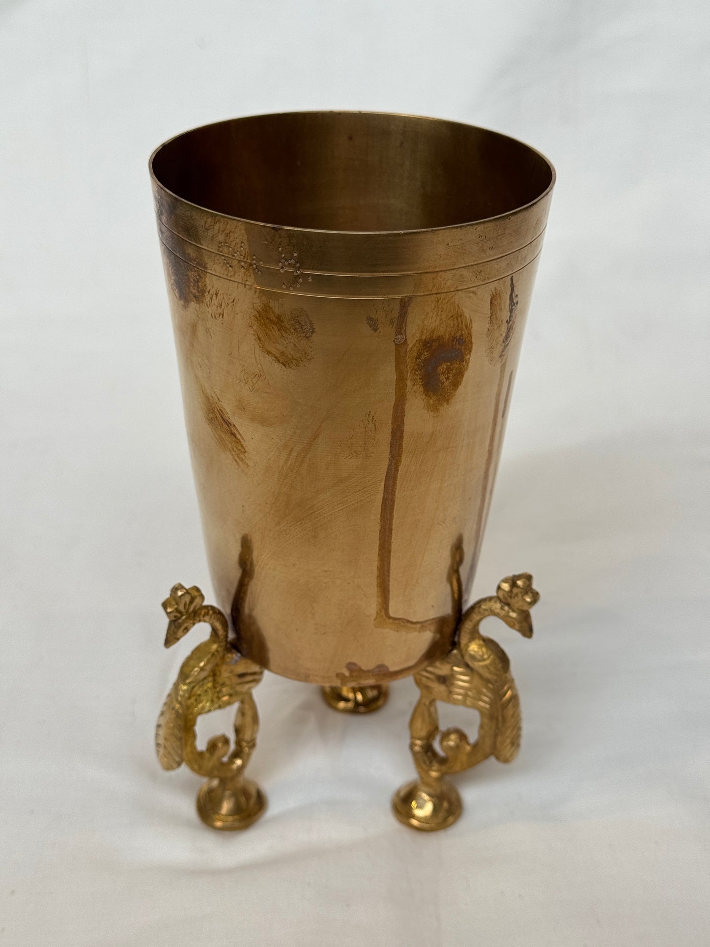 Brass tumbler vase with peacock legs