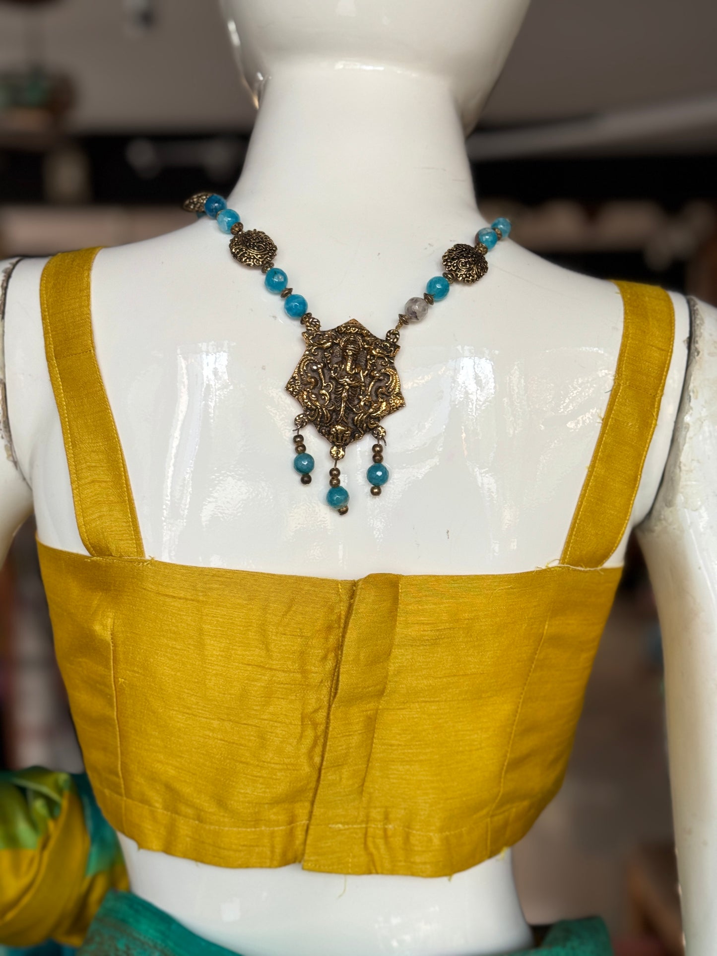 Yellow strap sleeves back open silk blouse