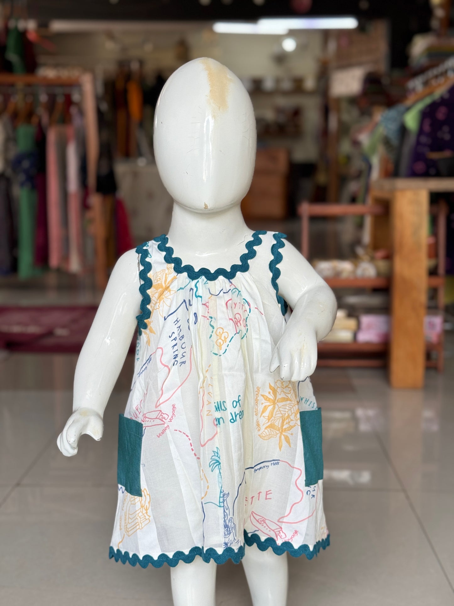 Off white soft cotton stripes frock with travel theme digital print