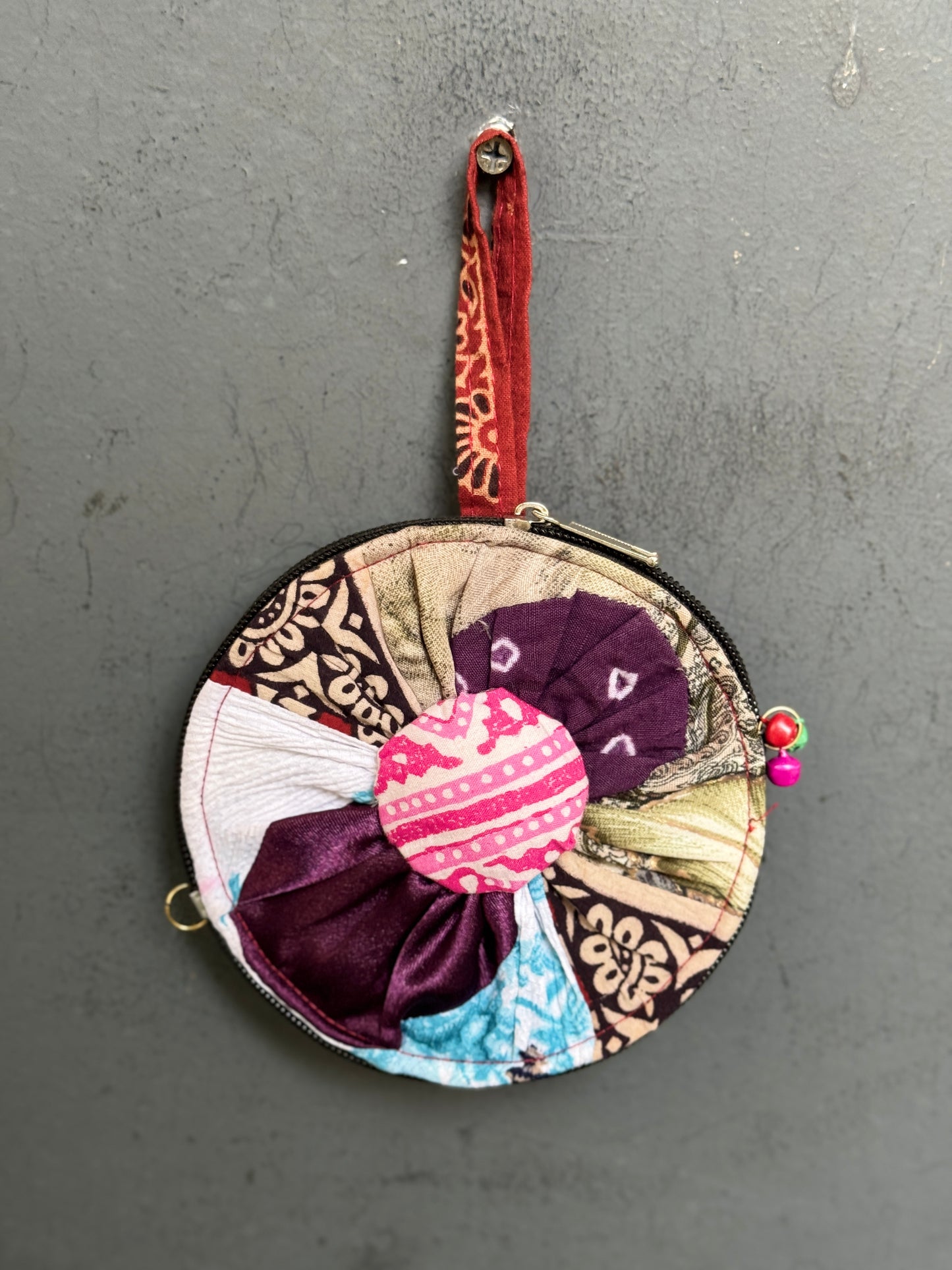 Upcycled handwoven fabric patch work round gifting / coin pouch with zipper closure