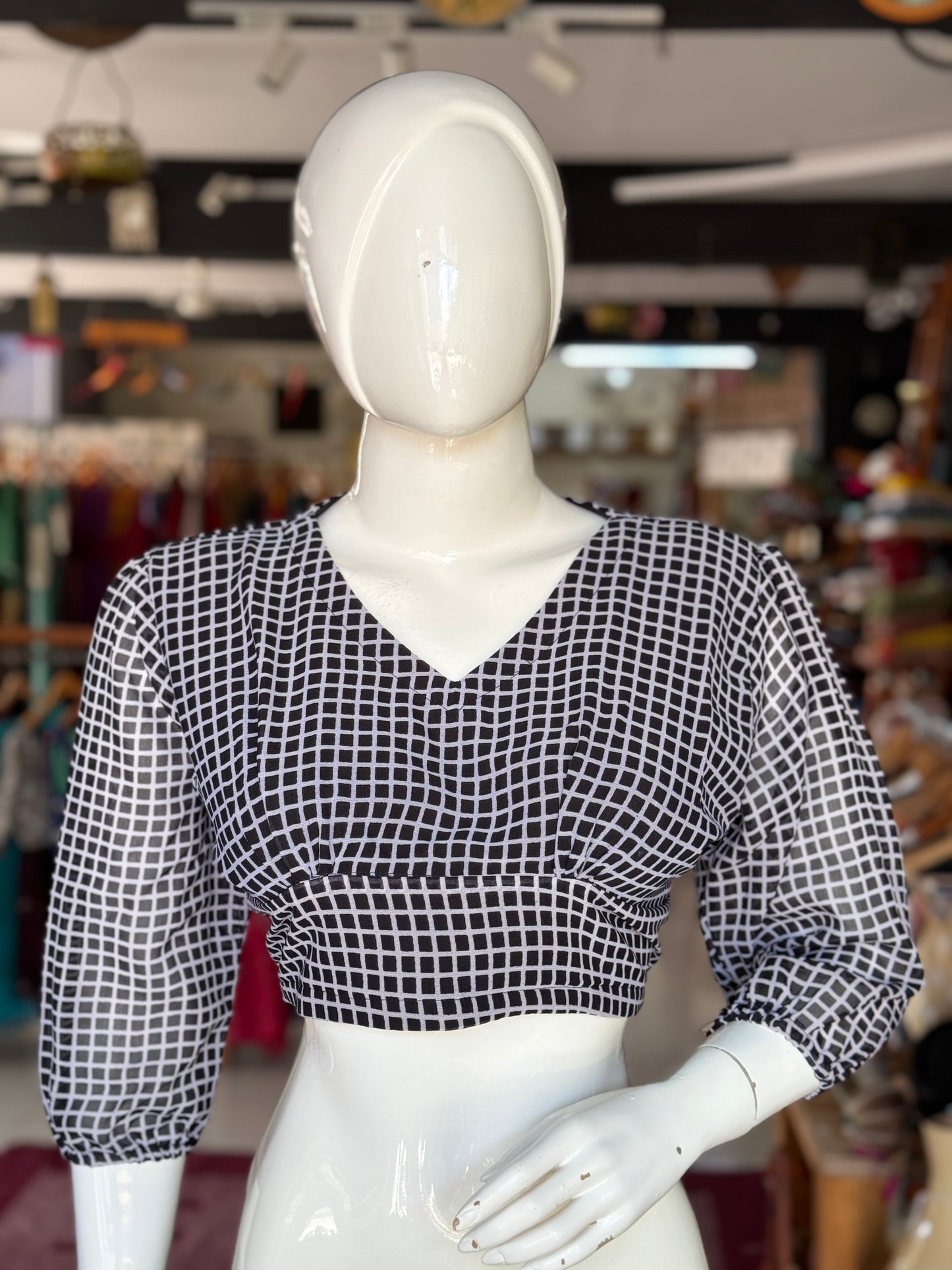 Georgette smart black checkered blouse with long sleeves