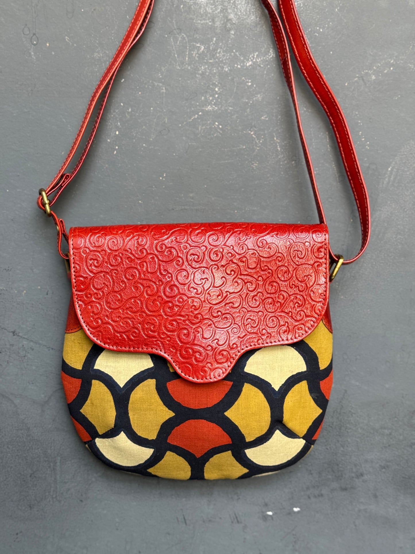 Hand crafted adjustable length sling bag - block printed fabric and embossed leather - multiple designs