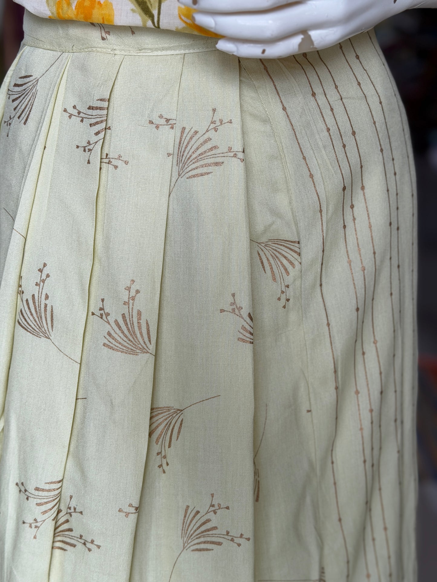 Light yellow wrap around skirt with plain and pleated panels - free size