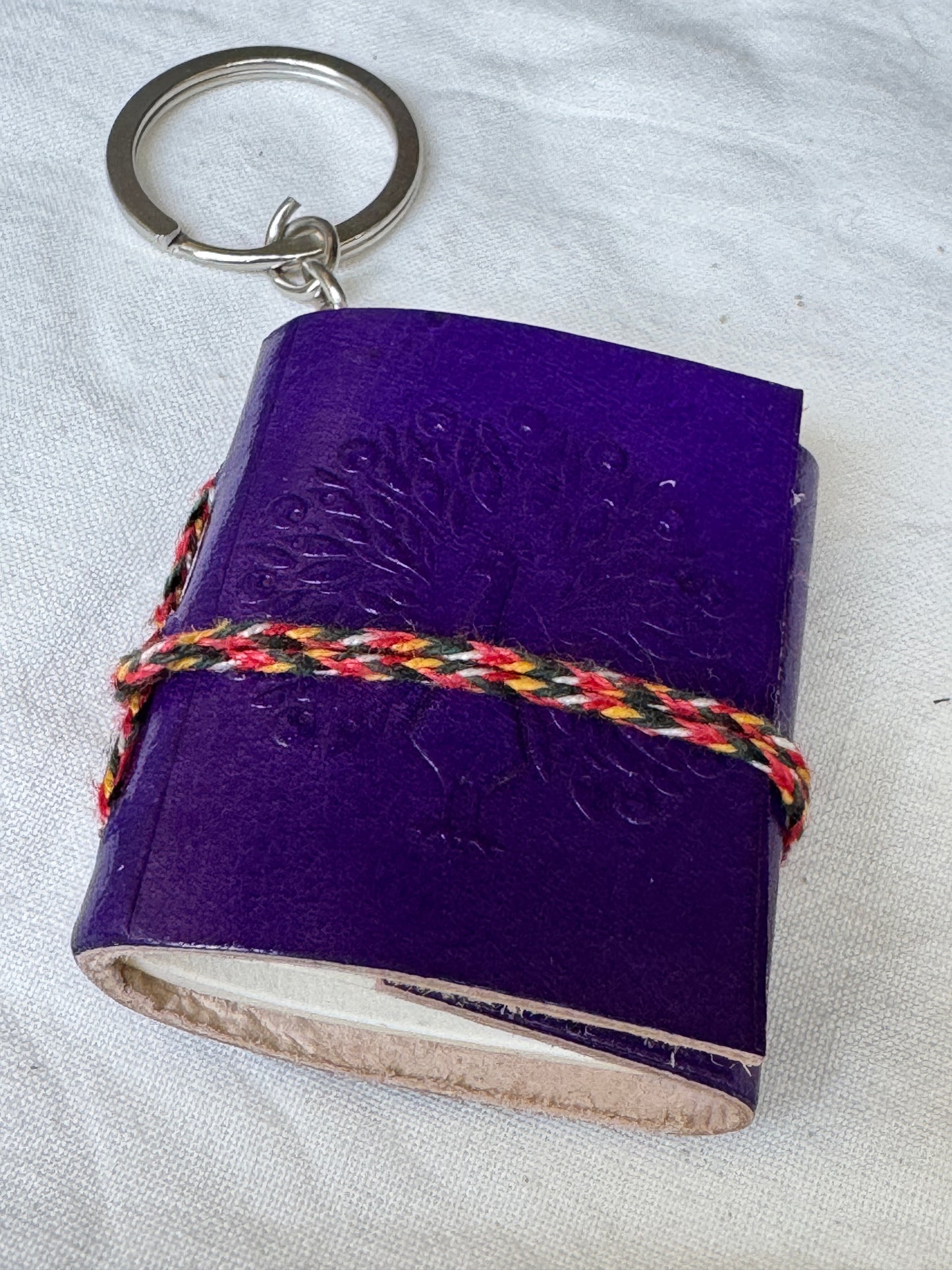 Key ring with Leather embossed handcrafted notebook with thick papers