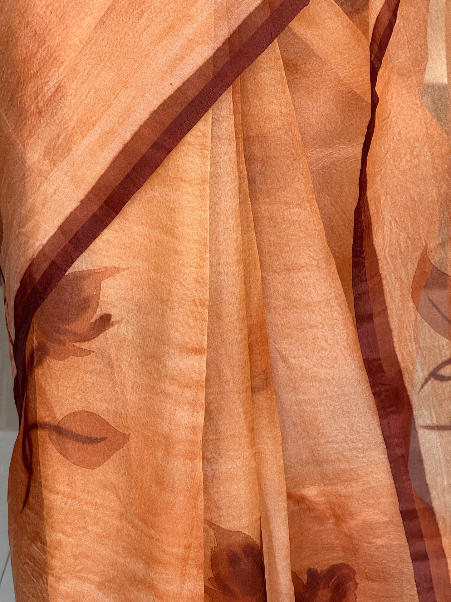 Peach brown hand painted organza saree