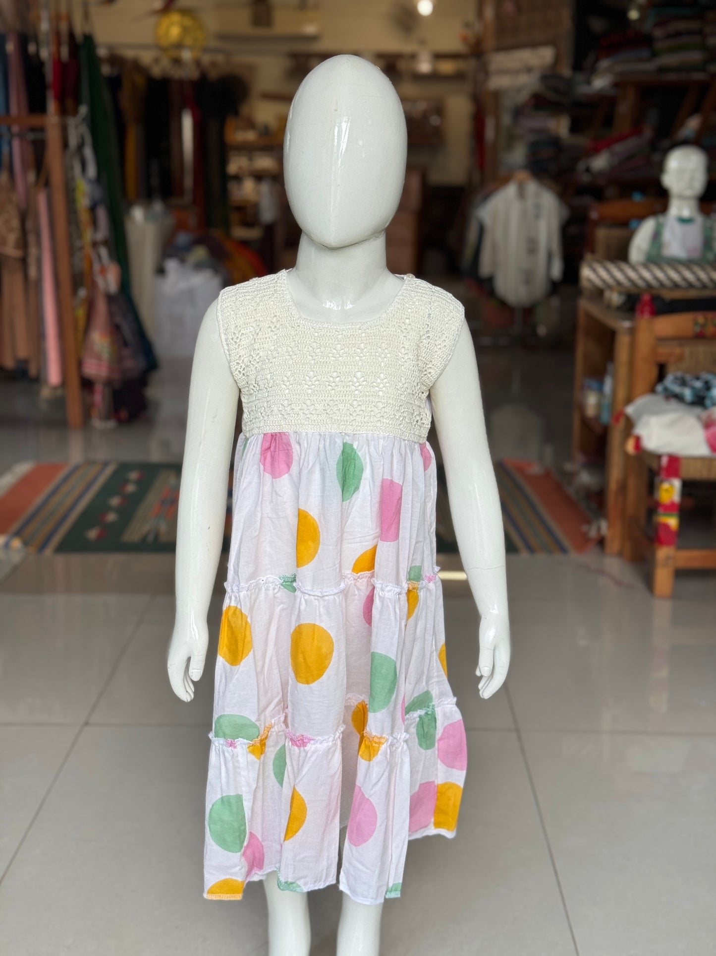 Tiered hand block printed cotton frock with crochet yoke for girls