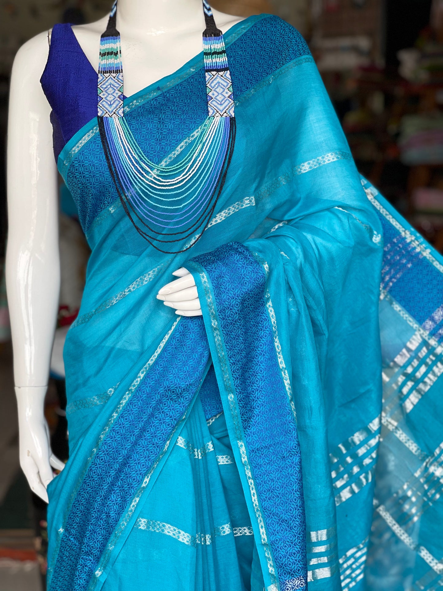 Bright royal blue handwoven cotton saree with multiple stripes border