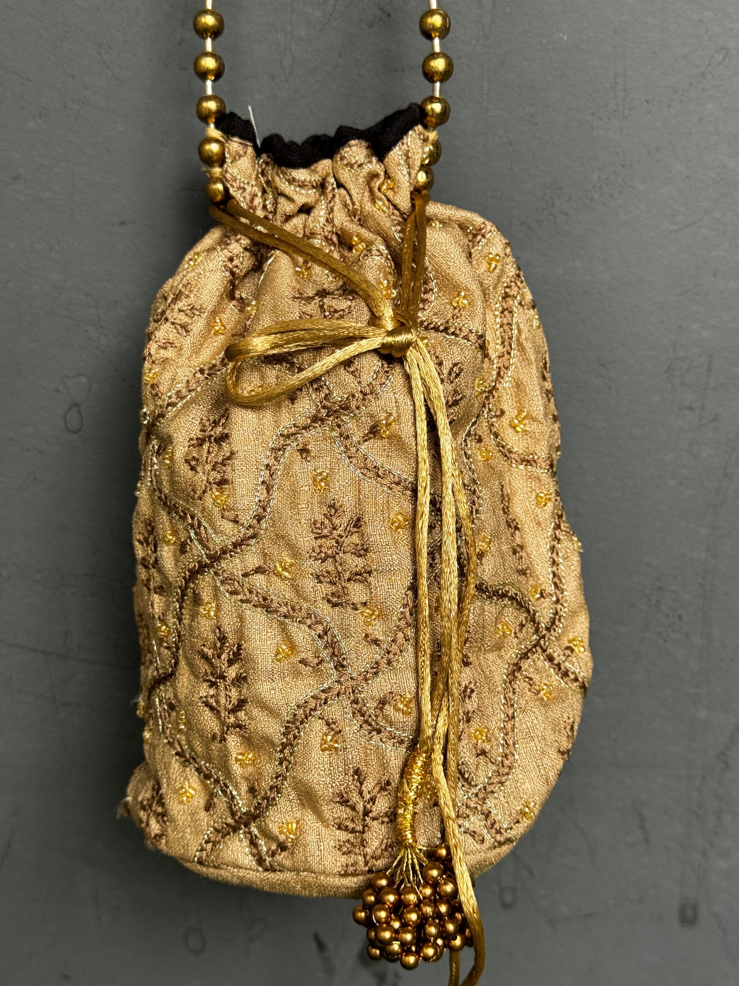 Gold Chikankari hand embroidered potli bag