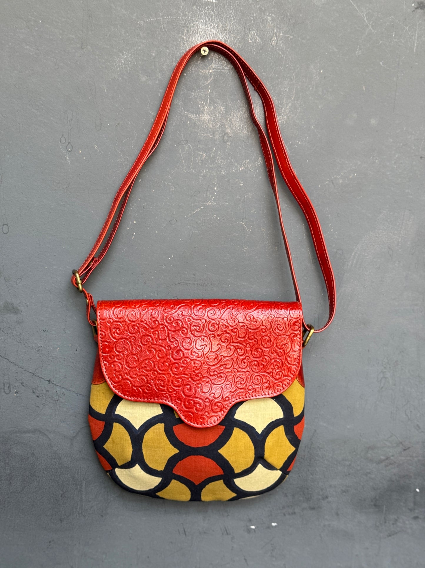 Hand crafted adjustable length sling bag - block printed fabric and embossed leather - multiple designs