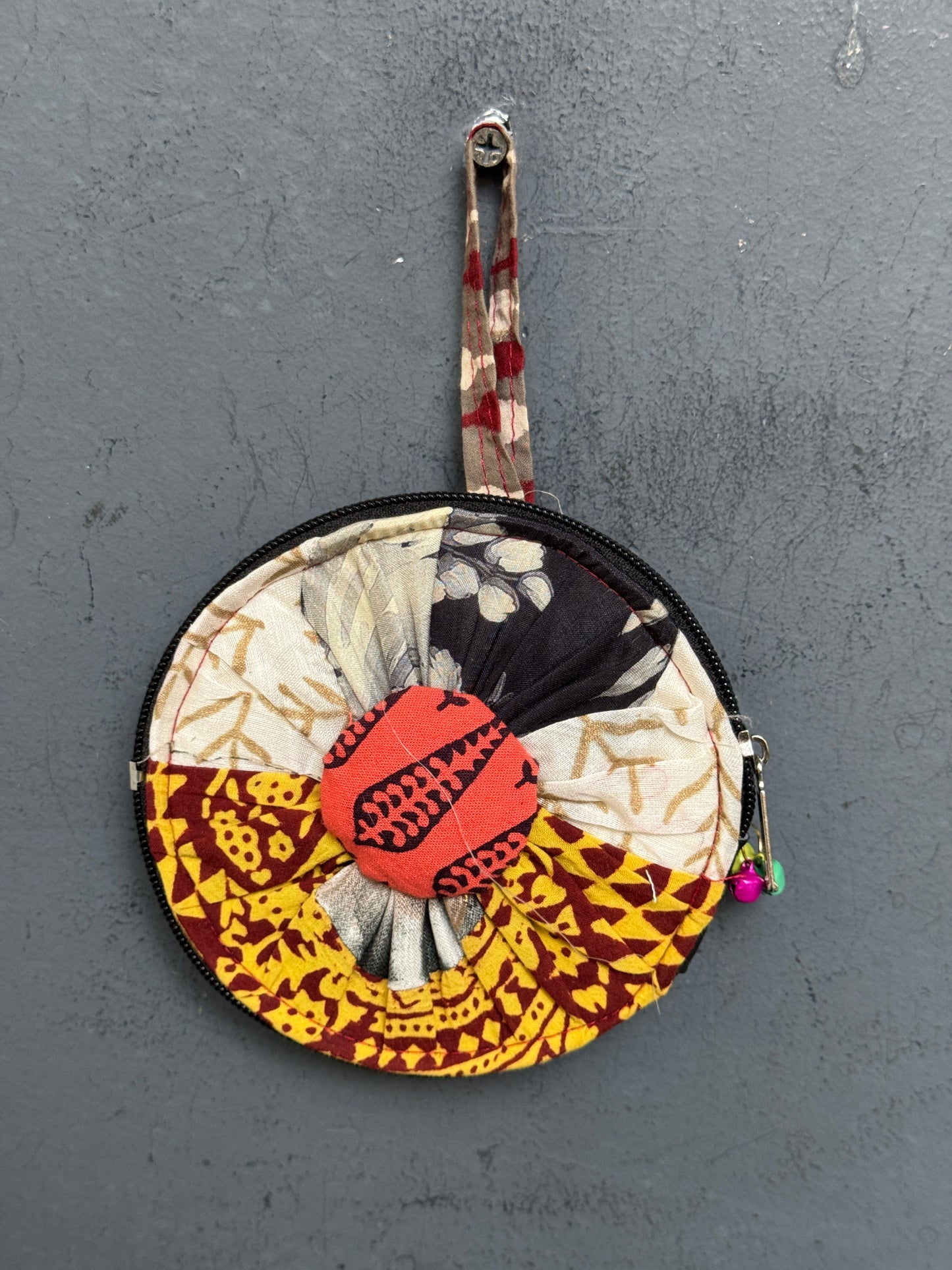 Upcycled handwoven fabric patch work round gifting / coin pouch with zipper closure