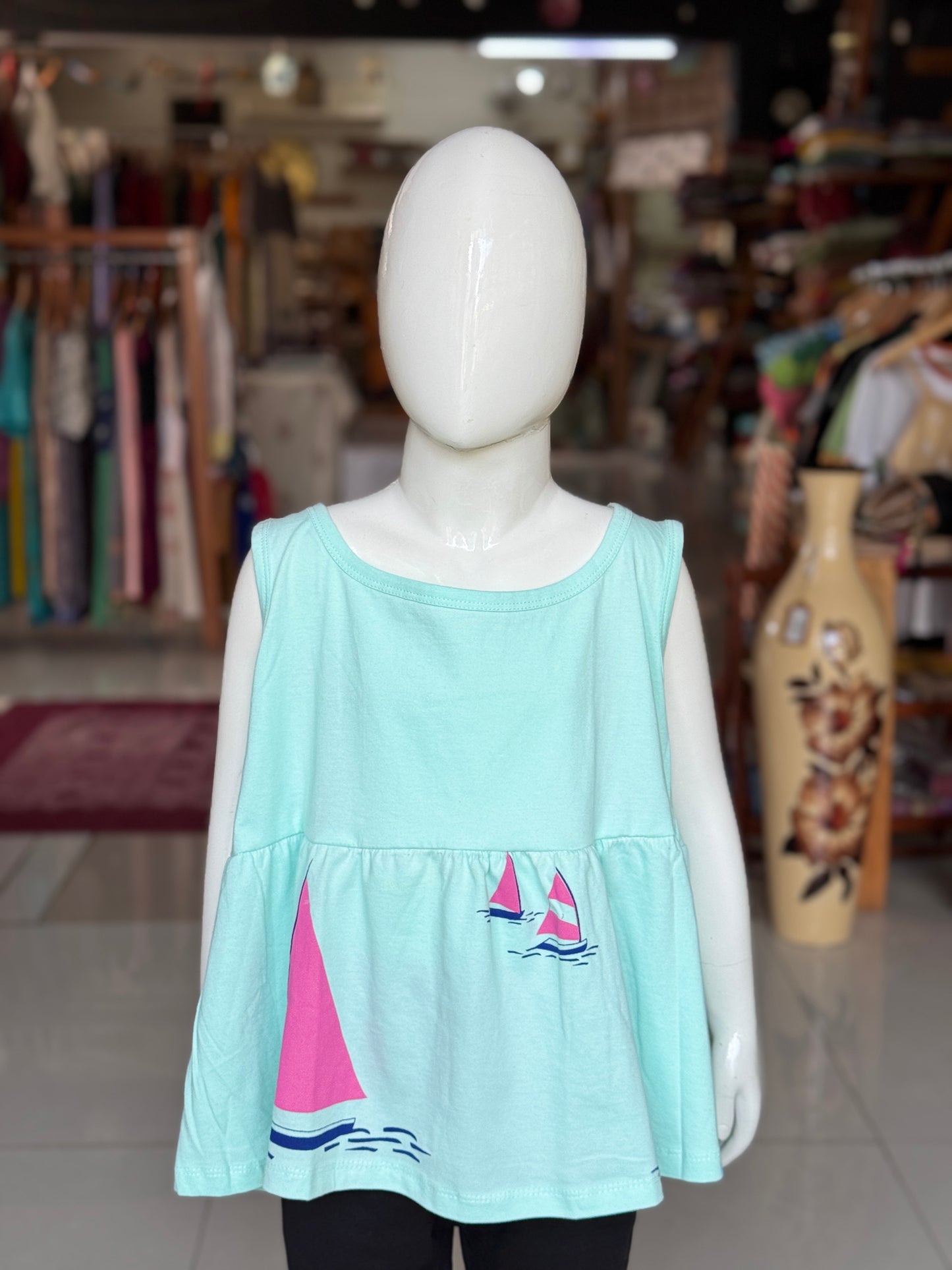 Blue knit cotton sleeveless top for girls with boat print