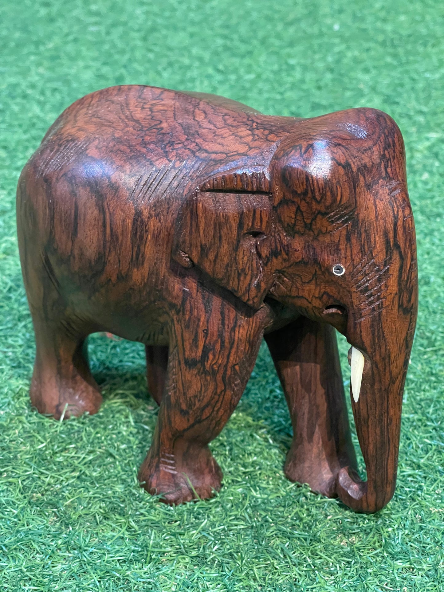 Solid rose wood hand carved wooden elephant decor with beautiful wooden grains patterns