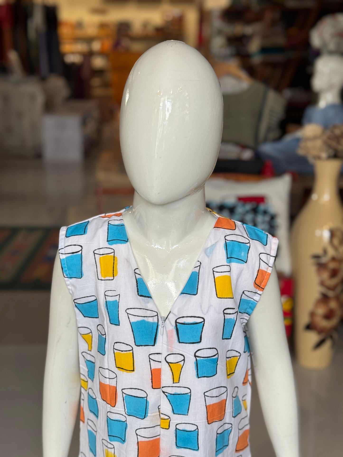 Quirky tumblers hand block printed cotton romper outfit for girls with V neck and front zipper