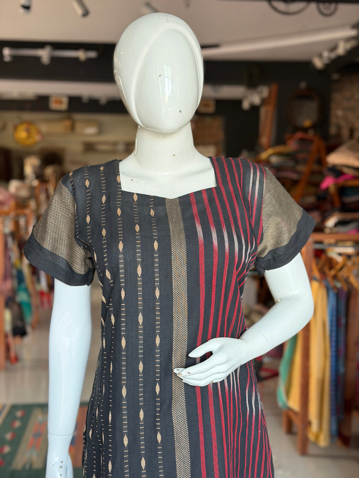 Black hand woven cotton straight kurti with beige and red Ikat designs