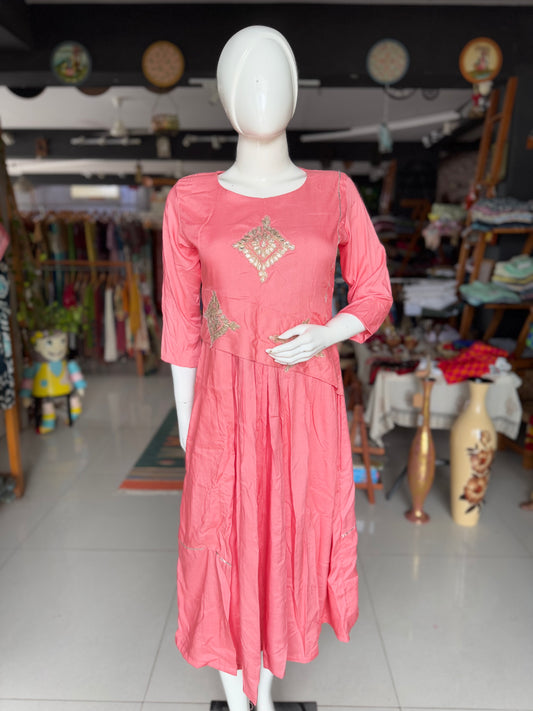 Peach soft rayon designer dress with low pleats and gota detailing