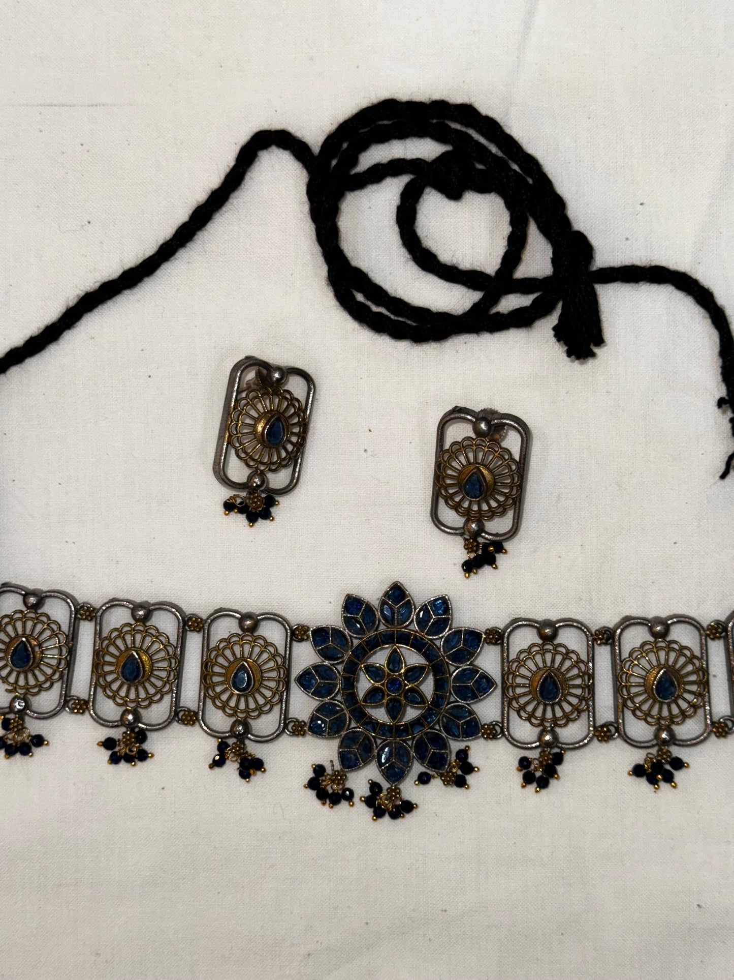 Blue stones choker and earrings set in gold silver dual tone