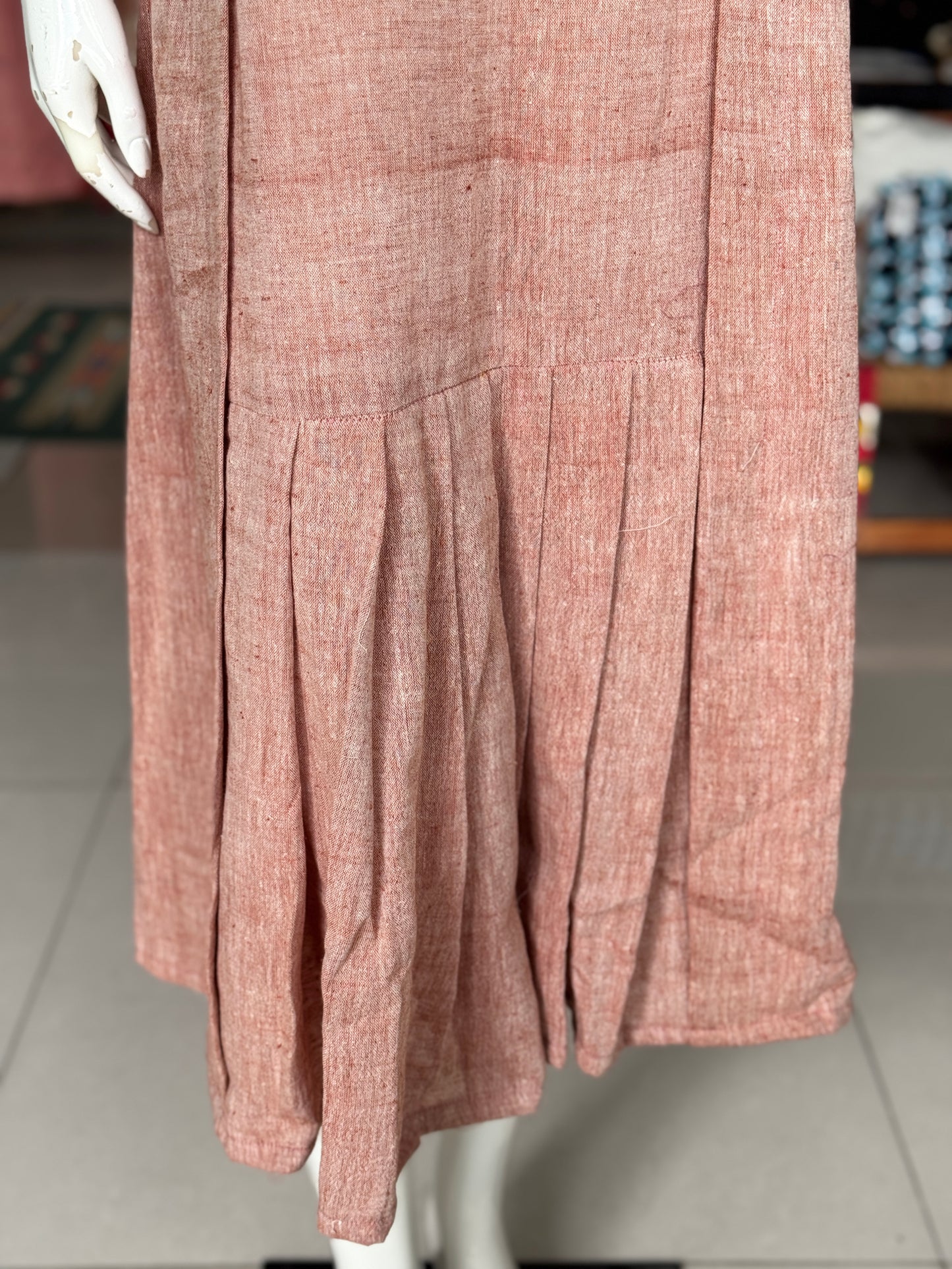 Light peachish maroon kala cotton hand woven pleated dress with mirror embroidery on yoke